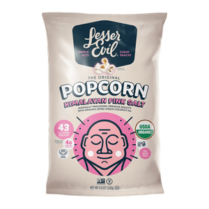 Lesser Evil The Original Popcorn Himalayan Pink Salt, featuring a cream-colored packaging with a pink and black graphic of a face, and product details on a white background.