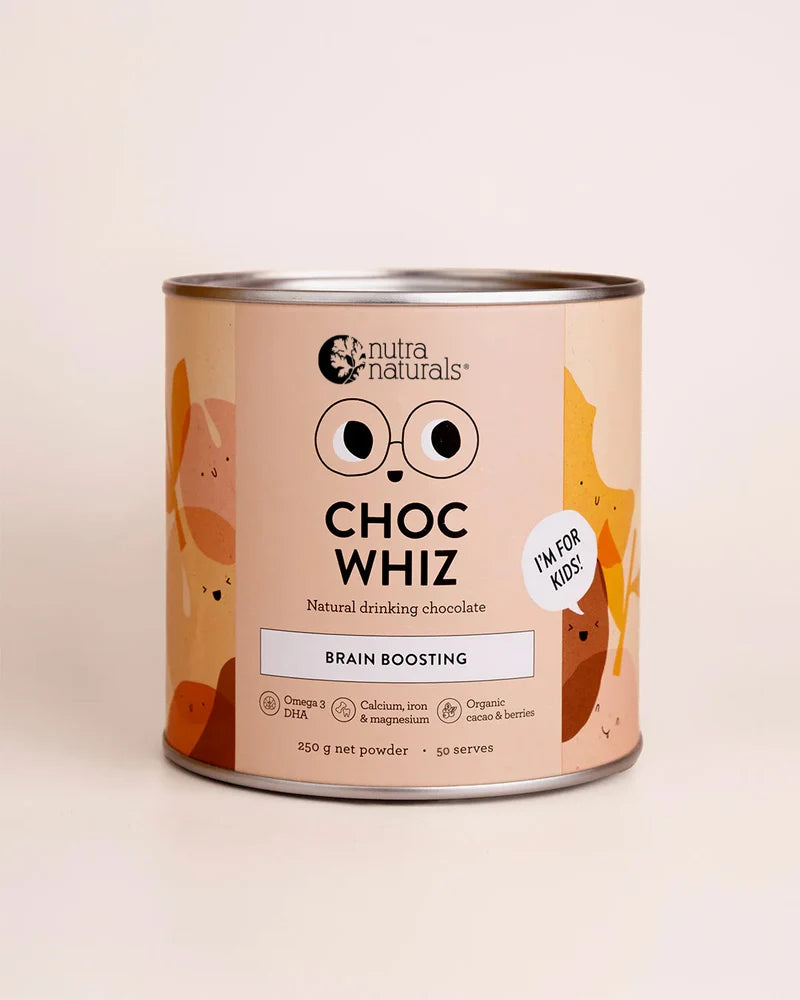 A cylindrical metal tin of Nutra Naturals Choc Whiz Brain Boosting powder, featuring a warm peach and orange label with cartoon eyes and chocolate chip illustrations, set against a solid cream background.